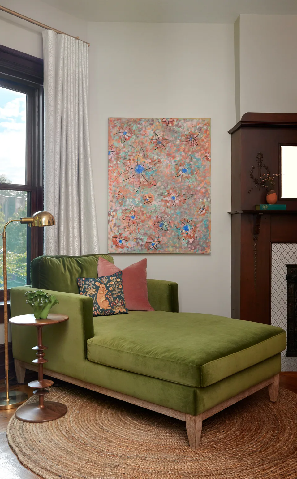 Olive velvet chaise lounge in the bay window with Morris & Co. drapery in the primary bedroom at the Prospect Heights Brownstone, Brooklyn, New York, interior design by Alexandra Peck Design